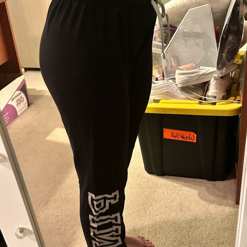 Black Joggers with White Lettering